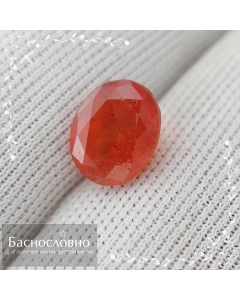 Сертифицированный натуральный красновато-оранжевый триплит из Пакистана огранки овал 8,31x6,75мм 2,52 карата (драгоценный камень)