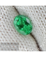 Натуральный ярко-зелёный цаворит (тсаворит) гранат из Кении огранки овал 6,19x4,52мм 0,69 карат (драгоценный камень)