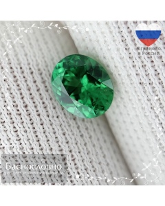 Сертифицированный ярко-зелёный гранат цаворит из Кении огранки в Баснословно овал 5,55x4,58мм 0,52 карат